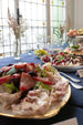 Gold and white serving platters for rent at Madame de la Maison