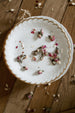 Antique gold and white plates from Madame de la Maison