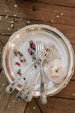 Antique gold and white plates from Madame de la Maison