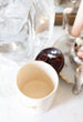 Antique jar with horse drawn carriage