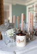 Antique jar with horse drawn carriage