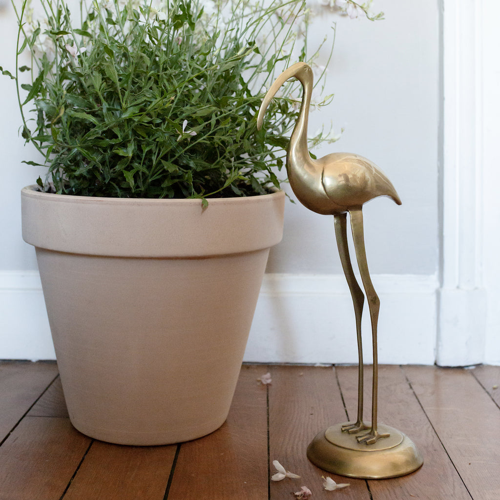 Antique brass Crane Sculpture sold on www.madamedelamaison.com