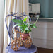 vintage rattan tricycle plant holder