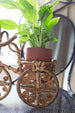 vintage rattan tricycle plant holder 